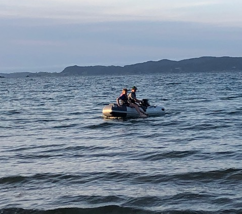Kids out in an inflatable boat