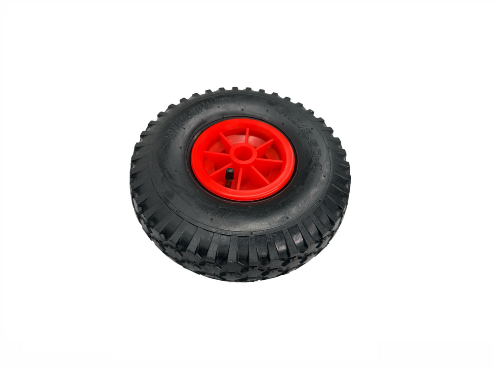 black tire with a red wheel cover